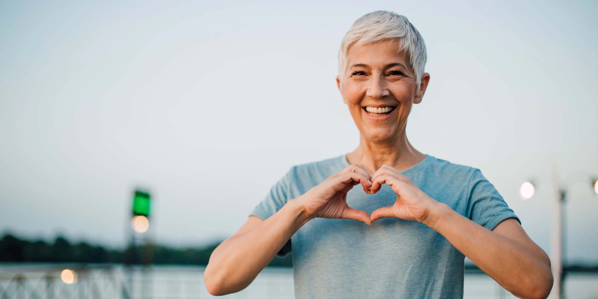 Chiropractic Centennial CO Woman Making Heart