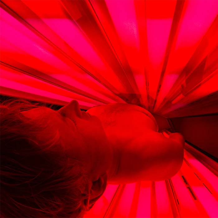 Man Getting Red Light Therapy Treatment